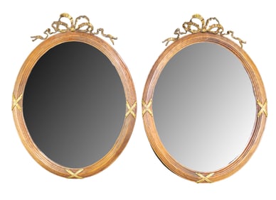 Pair of French Louis XVI style oval framed mirrors