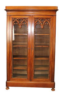 French Gothic Revival 2 door bookcase in mahogany: French Gothic Revival 2 door bookcase in mahogany. 19th century 76"h x 48 1/2"w x 17 1/2"d