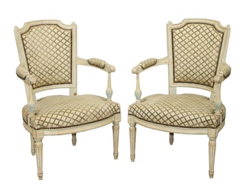 Pair of French Louis XVI style upholstered armchairs and fluted tapered legs