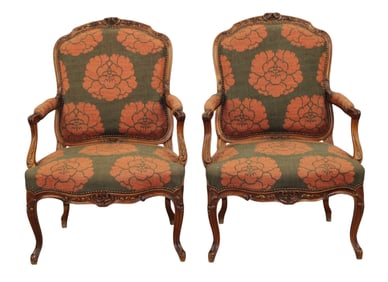 Pair of French Louis XV style walnut armchairs with floral upholstery