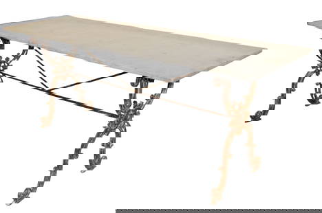 French cast iron cafe table with marble top: French cast iron cafe table with marble top. Early 20th century. 28 1/2"h x 75 1/4"l x 25"d
