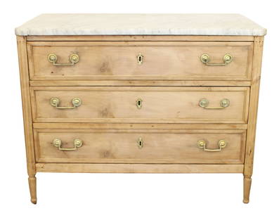 French Louis XVI commode in bleached walnut on tapered legs with white marble top: French Louis XVI 3 drawer commode in bleached walnut on tapered legs with white marble top. 19th century. 34 5/8"h x 45 1/4"w x 23"d