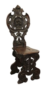 Italian relief carved chair with focal mask