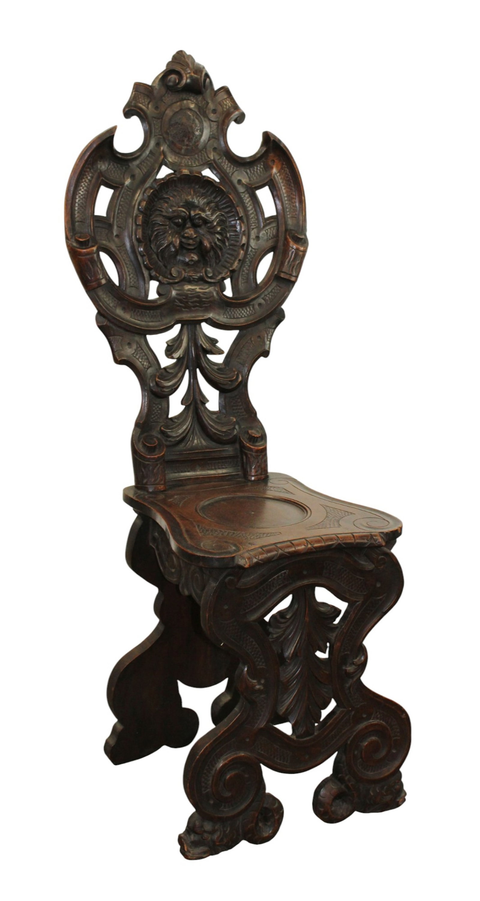 Italian relief carved chair with focal mask: Italian relief carved chair with focal mask. 44 1/2"h x 15"w x 15"d, seat height 18"