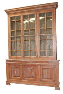 French 3 door bookcase in pine with paned glass doors: French 3 door bookcase in pine with paned glass doors. 19th century. 115 1/2"h x 79"w x 14"d