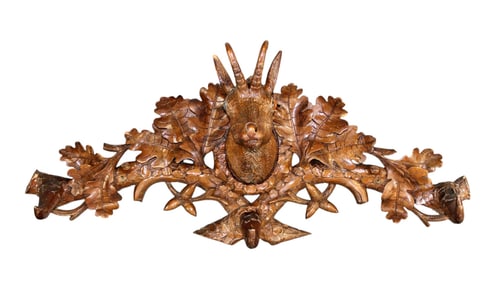 French carved walnut wall mount hat rack with antelope. Artist signed on the back.
