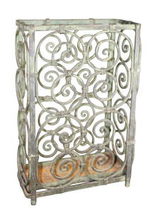 French Art Deco scrolled cast iron umbrella stand: French Art Deco scrolled cast iron umbrella stand 21"h x 13 5/8"w x 6 1/2"d Weight: 17lbs