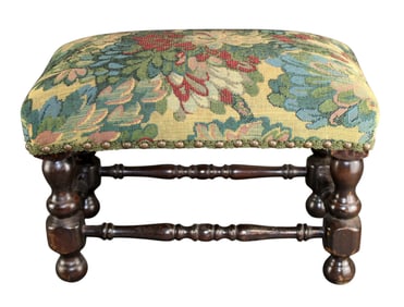 English foot stool on turned legs with tapestry upholstery