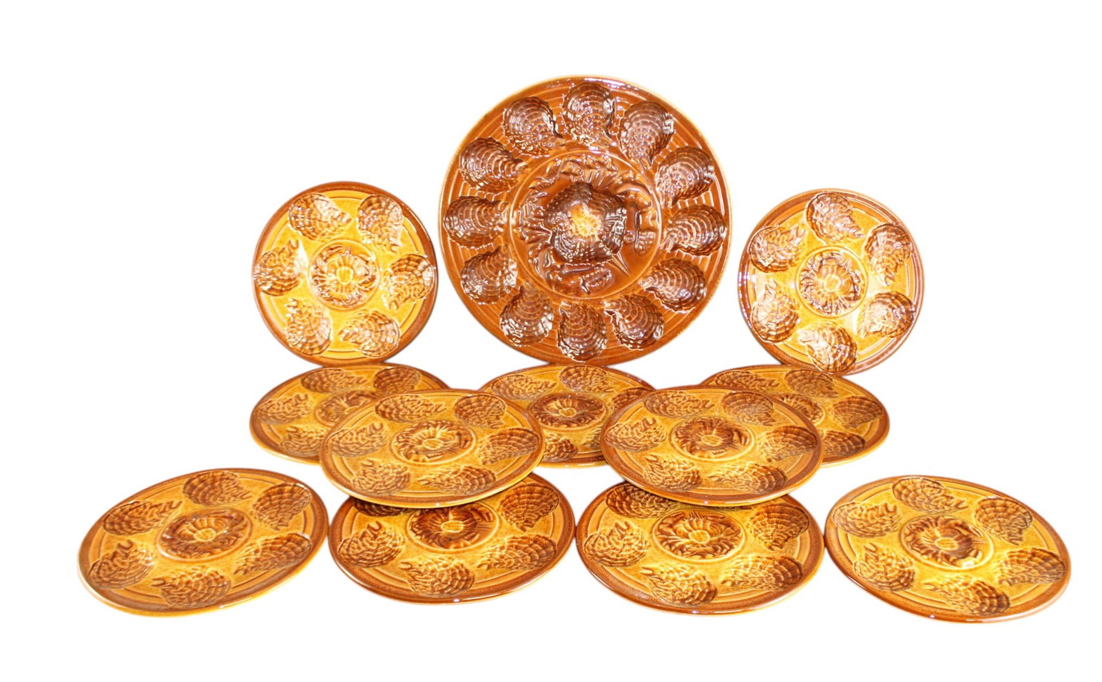 Lot of 12 French Sarreguemines oyster plates with platter: Lot of 12 French Sarreguemines oyster plates with platter. plates measure 9 3/4"dia, platter measures 15"dia. Weight: 25lbs