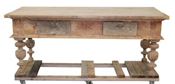 French Baroque style farmhouse table in walnut on carved legs with 2 drawers.