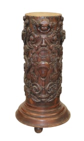 French walnut carved pedestal with cherub