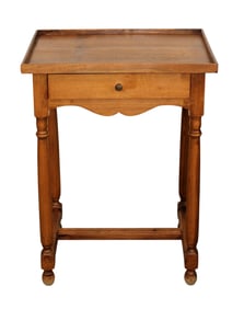 French side table in walnut with gallery edge