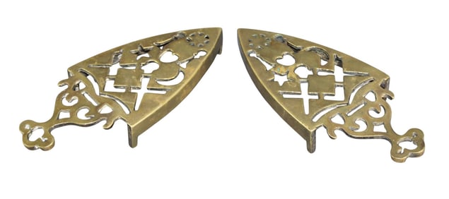 Pair of English pierced brass shield form trivets