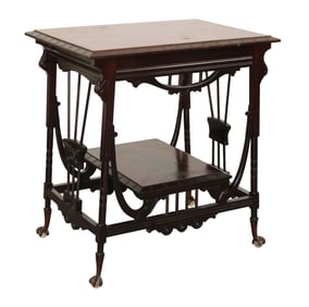 American parlor table in mahogany with glass ball and claw feet
