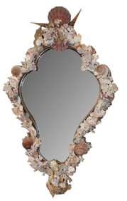 Shield form mirror encrusted with shells