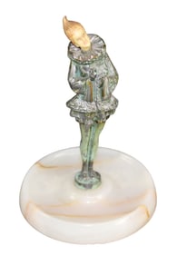 After Chiparus figural ring holder on onyx base