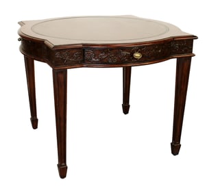 Mahogany embossed leather game table on tapered legs