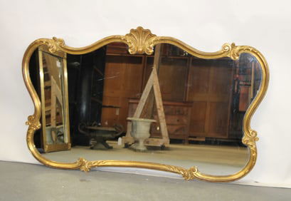 French Louis XV style gilt framed mirror with rocaille crest