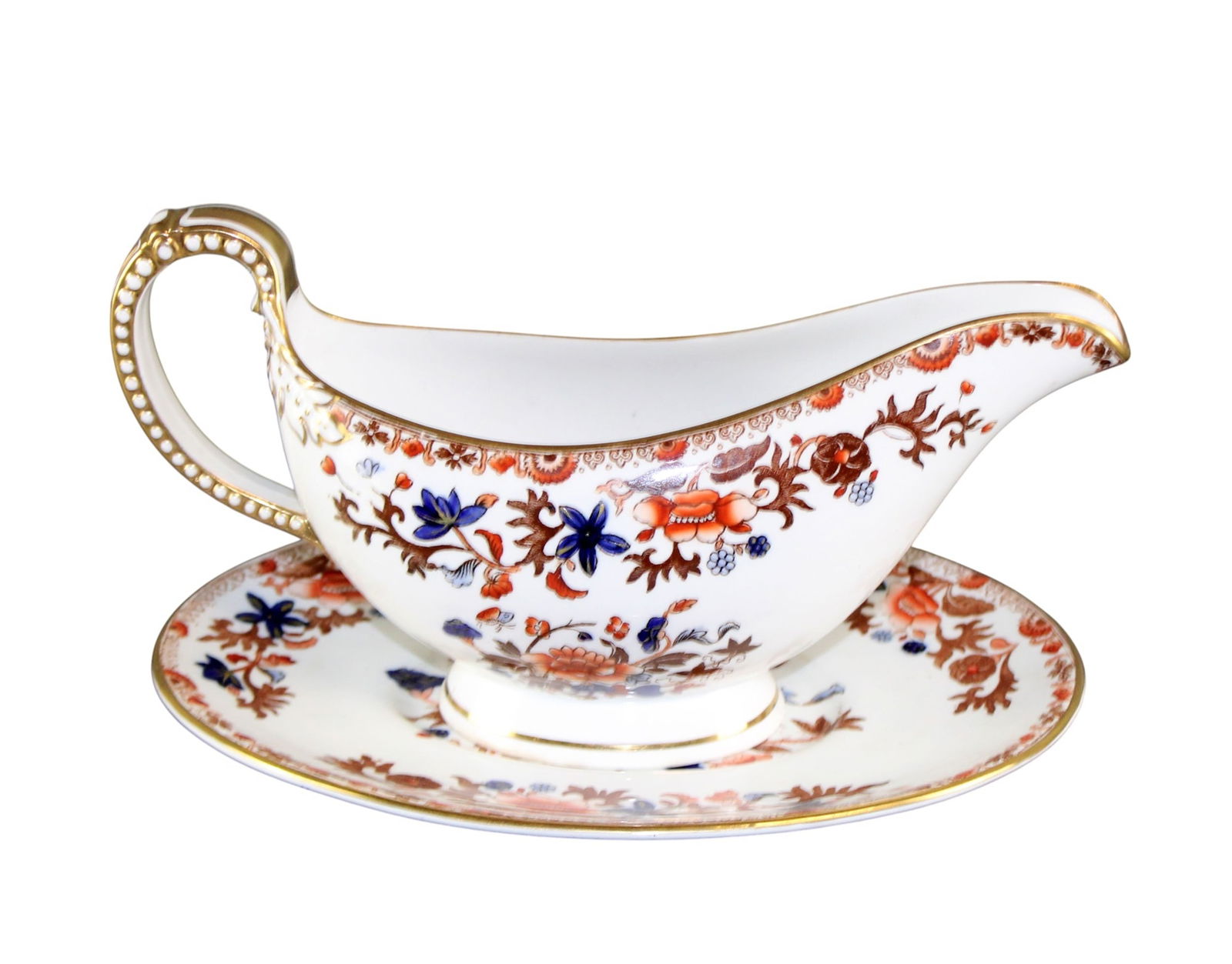 Copeland Spode gravy boat with under plate: Copeland Spode Old Imari gravy boat with under plate. Plate 8 1/2" x 6 1/4", gravy boat 4 1/2"h x 9"w. Weight: 1lb total
