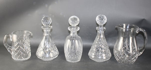 Lot of 3 Waterford crystal decanters and 2 pitchers