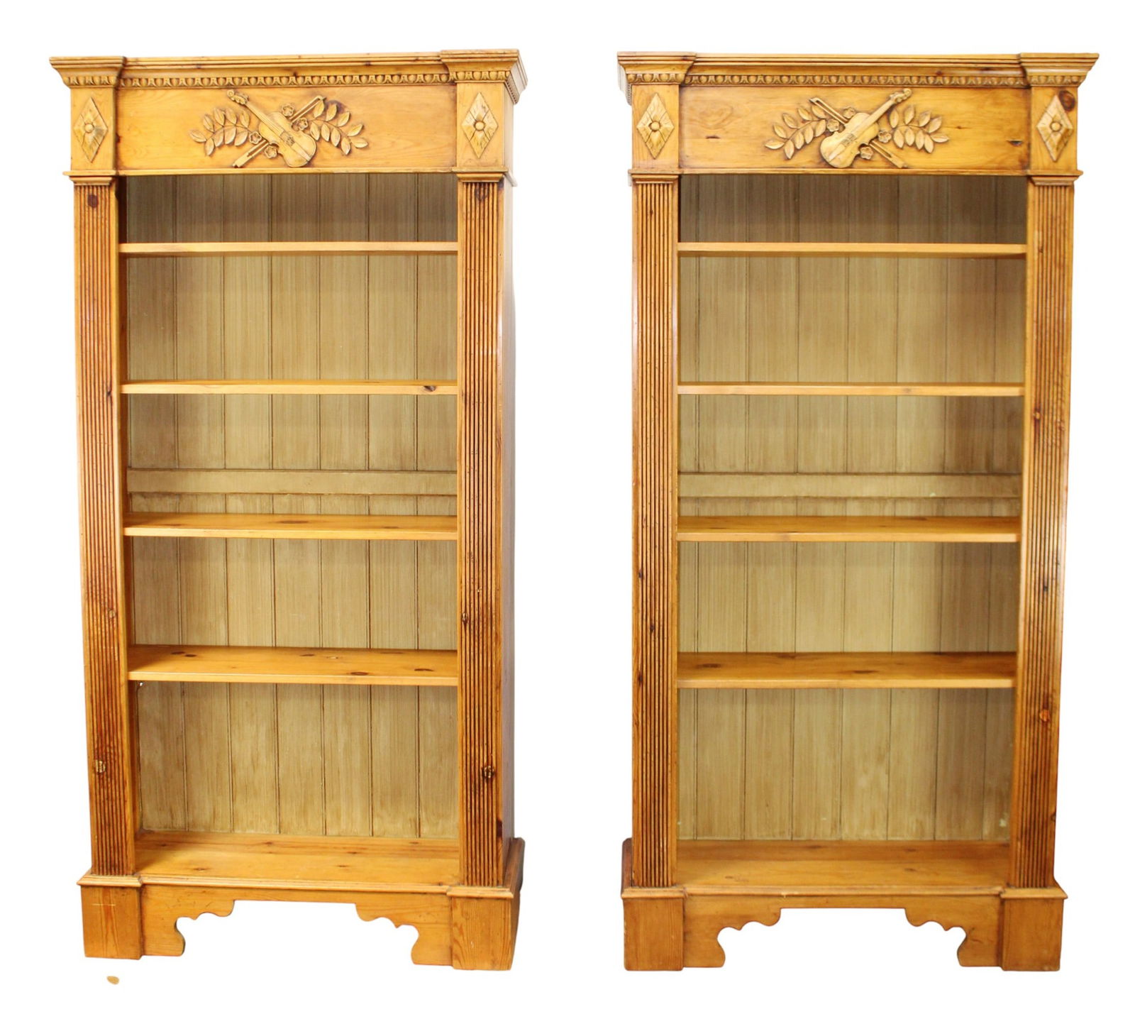 Pair of French carved pine open bookcases with musical attributes (1 of 15)