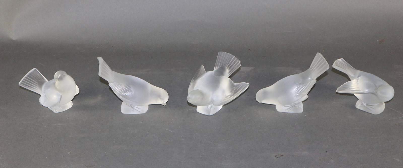 Lot of 5 Lalique crystal songbirds: Lot of 5 Lalique crystal songbirds. Each averages 4"h x 3 3/4"w x 5 1/4"d. Total weight: 4lbs