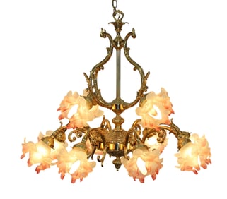 Victorian brass 12 arm chandelier with pink and white ruffle shades.