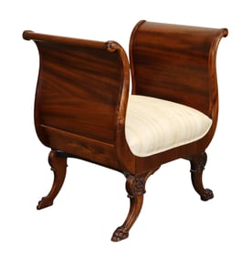 Regency style sleigh bench in mahogany on paw feet