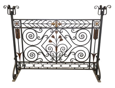 French forged iron fire screen with candle cups.
