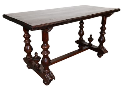 Italian trestle table in stained pine on turned legs with finials