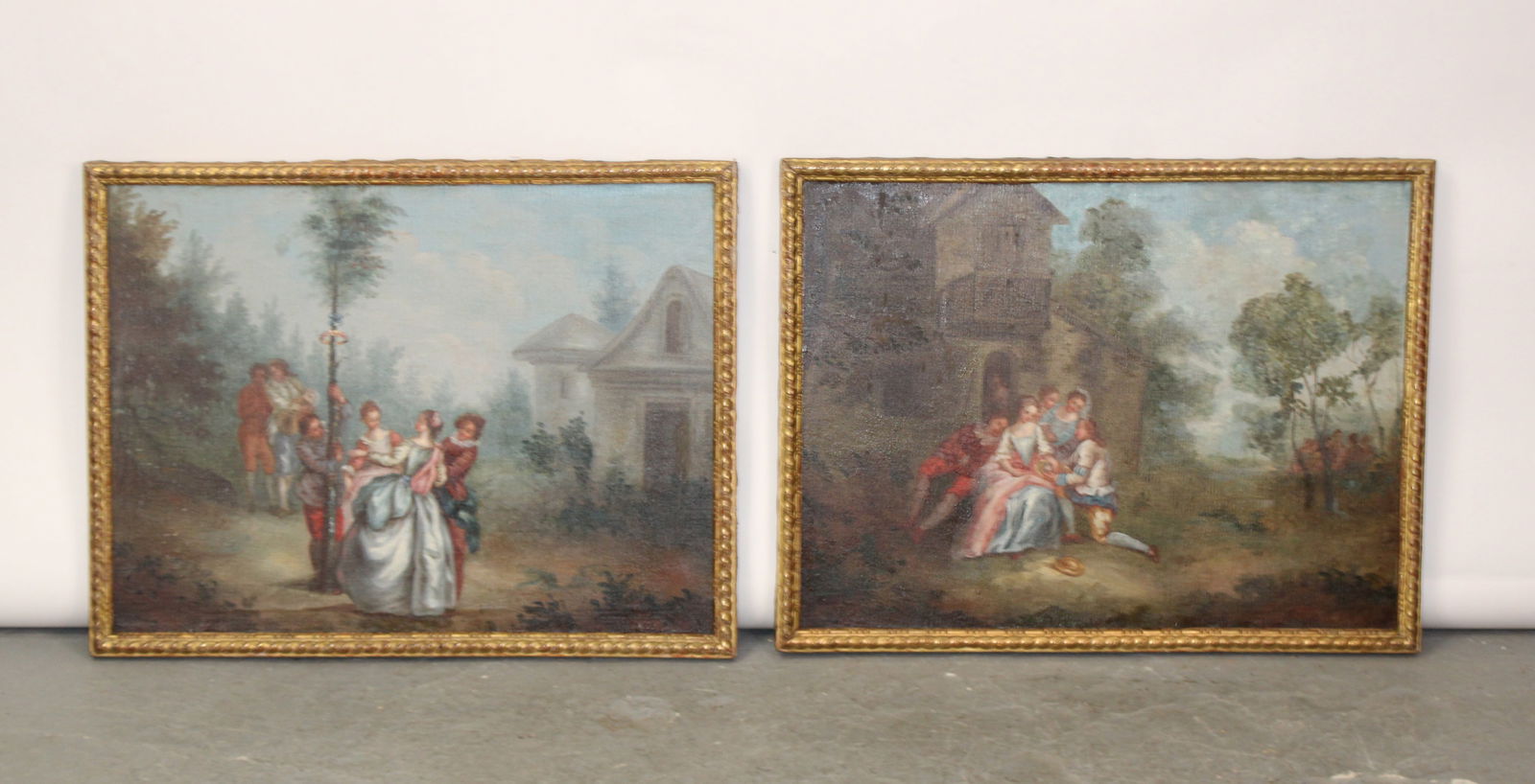 Companion pair of French oil on canvas landscape paintings with courting scenes (1 of 7)