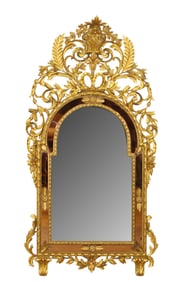 Italian Rococo carved giltwood mirror with elaborate crest