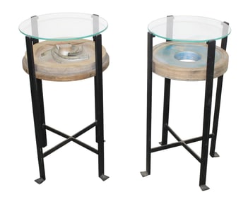 Pair of industrial gears mounted as side tables