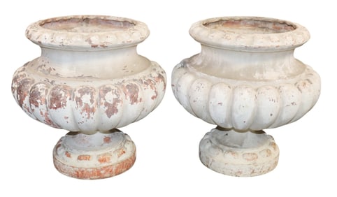 Pair of French cast iron classical garden urns