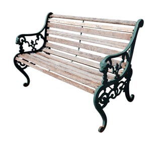 Cast iron garden bench with lion heads and wooden slats