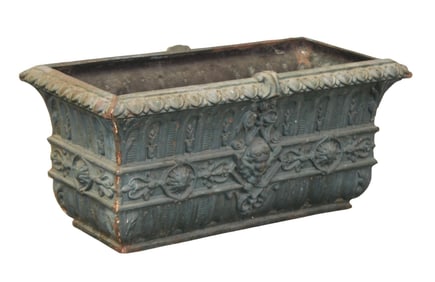French Regency style rectangle planter in cast iron with figural mask
