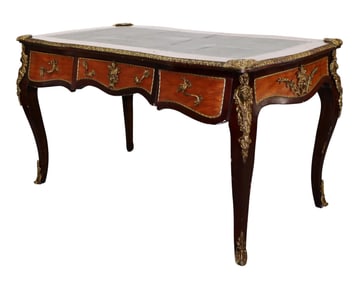 Louis XV style bureau plat desk with bronze figural mounts and leather top