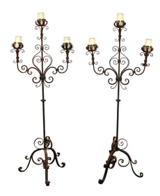 Pair of French scrolled iron candle torchieres