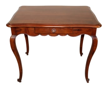 French Provincial side table in walnut with scalloped edge and single drawer