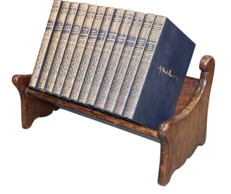 12 Bernard Shaw leather bound books on oak trough stand
