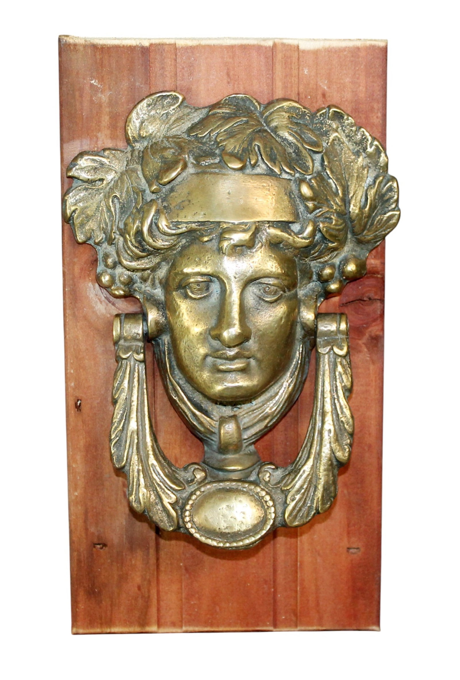 Bronze Athena door knocker: Bronze Athena door knocker. Late 20th century. Overall: 10 1/2"h x 5 1/2"w x 2 3/4"d. Weight: 5lbs