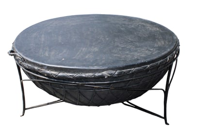 African drum mounted as a coffee table on iron base