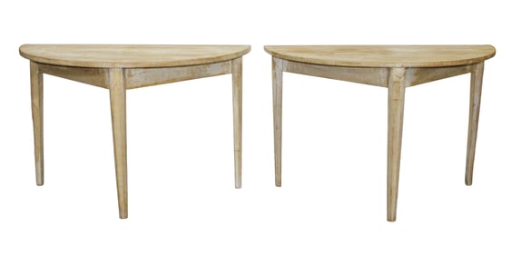Pair of Swedish demi lune console tables in pine on tapered legs