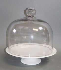 French glass cloche on white ceramic footed plate