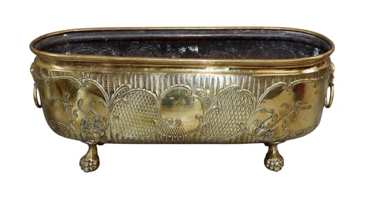 French embossed brass oval jardiniere on paw feet