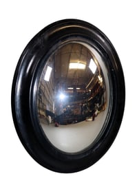 French oval convex butler's mirror in ebonized frame