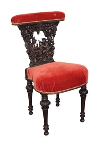 French relief carved smoking chair in oak