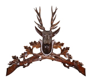 Black Forest carved walnut trophy plaque with deer head