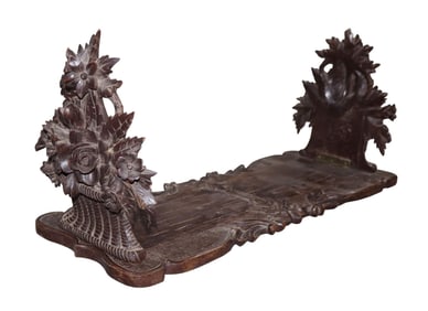Black forest carved walnut expanding book holder with flowering basket