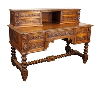 French Louis XIII relief carved desk in oak